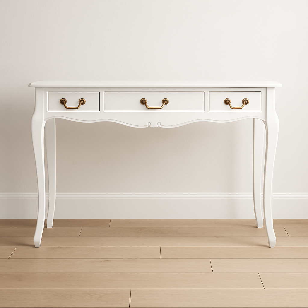 White console table with gold handles on a wooden floor and light-colored wall background