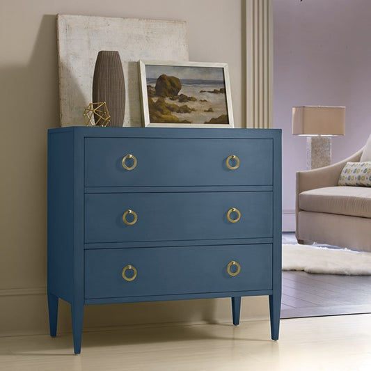 Modern blue wooden chest of drawers with brass ring handles – Ludwig dresser by Flashback